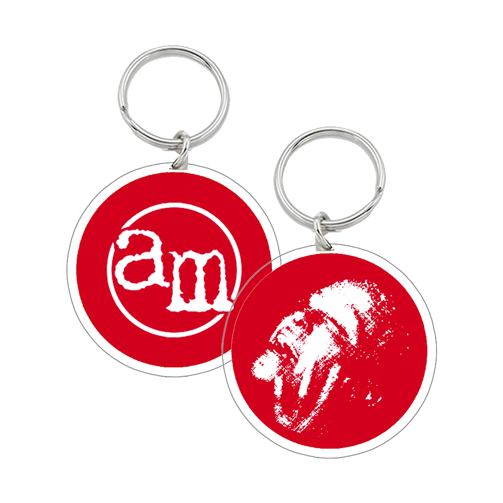 Two red and white round keychains.