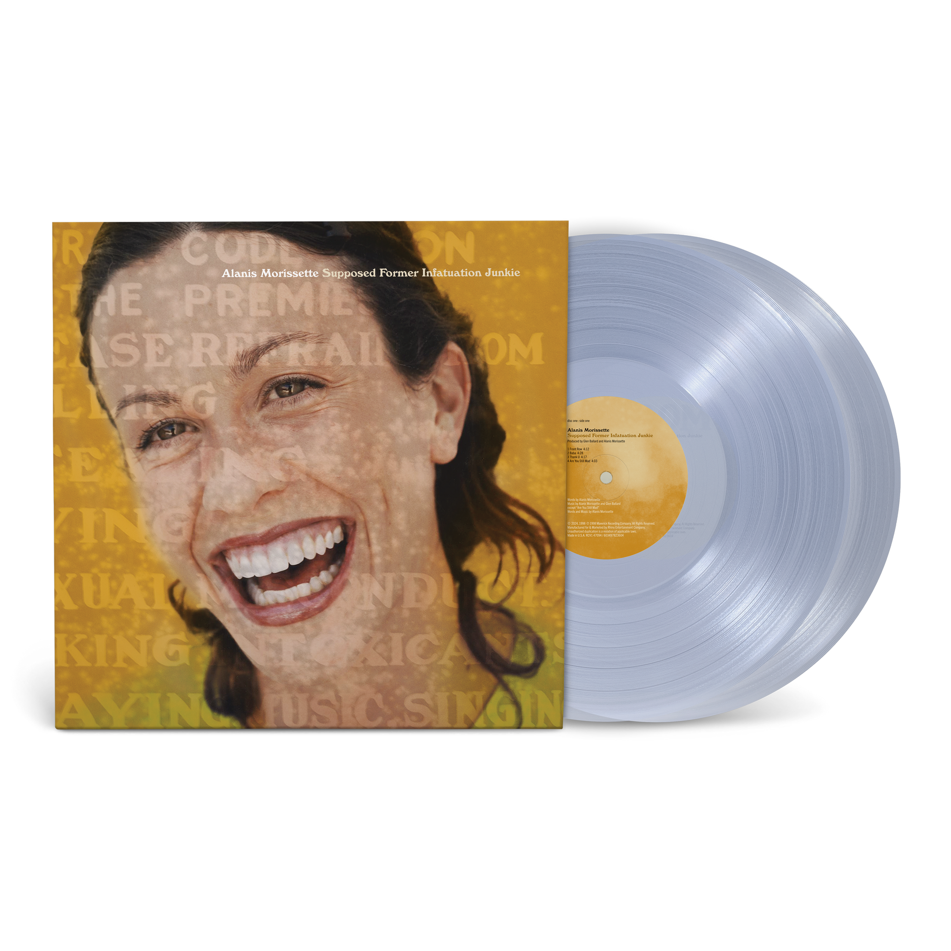 Vinyl record album featuring a smiling woman’s face on the cover.