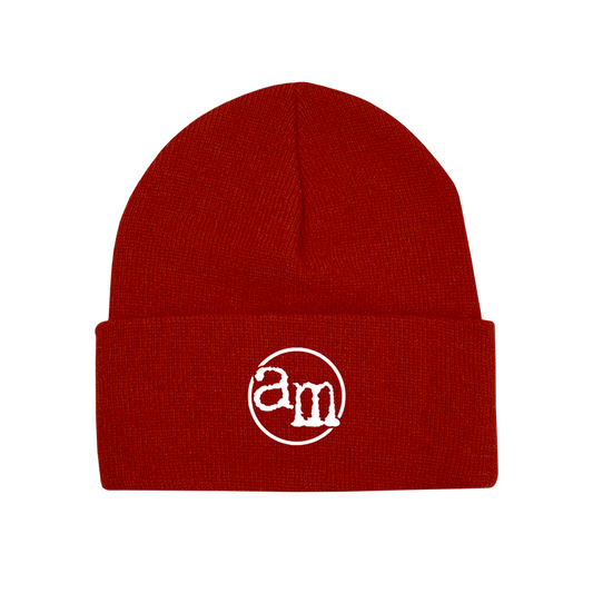 Red knit beanie with an embroidered white ’am’ logo.