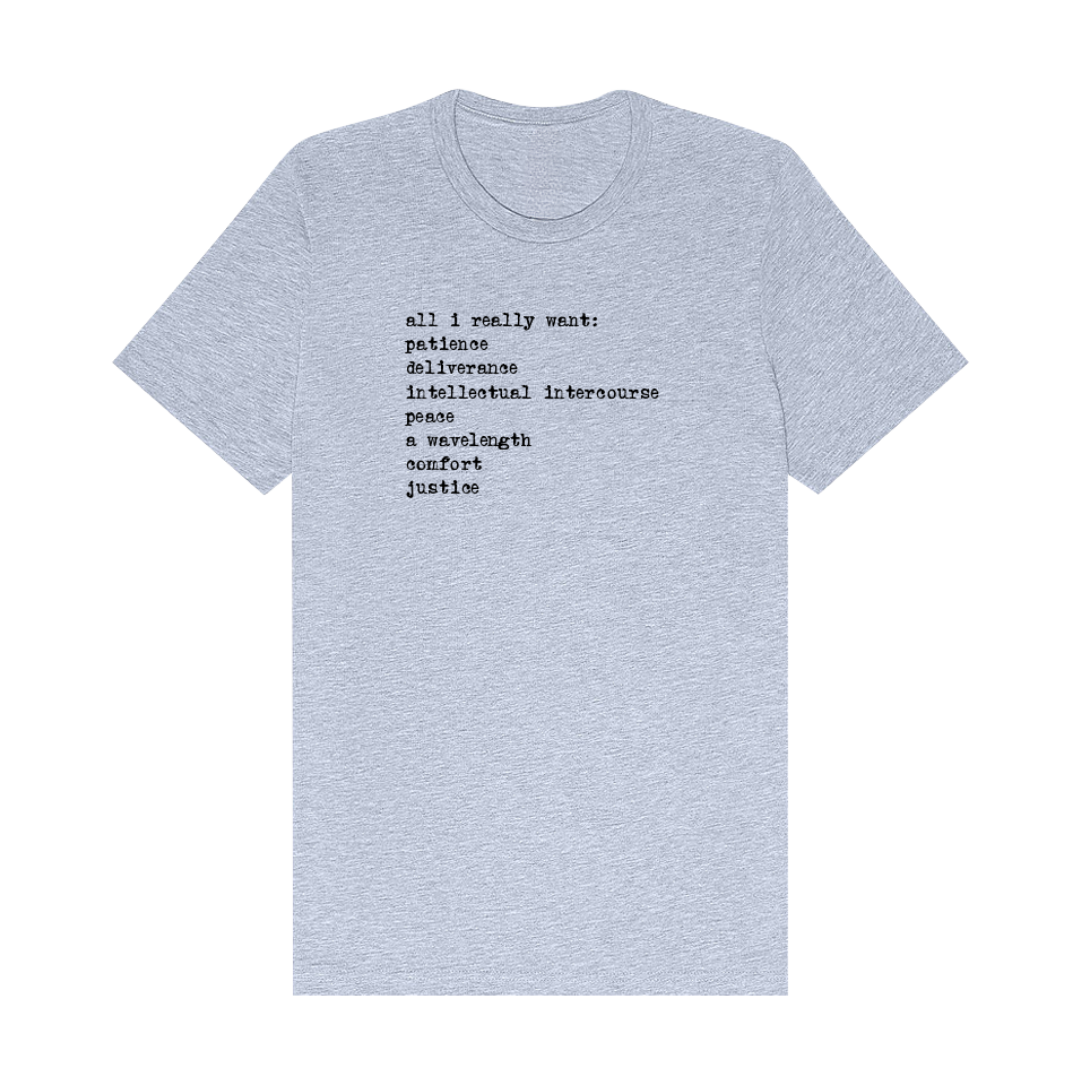 Light blue t-shirt with black text design featuring a list of desires.