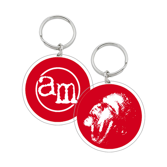 Two red and white round keychains.