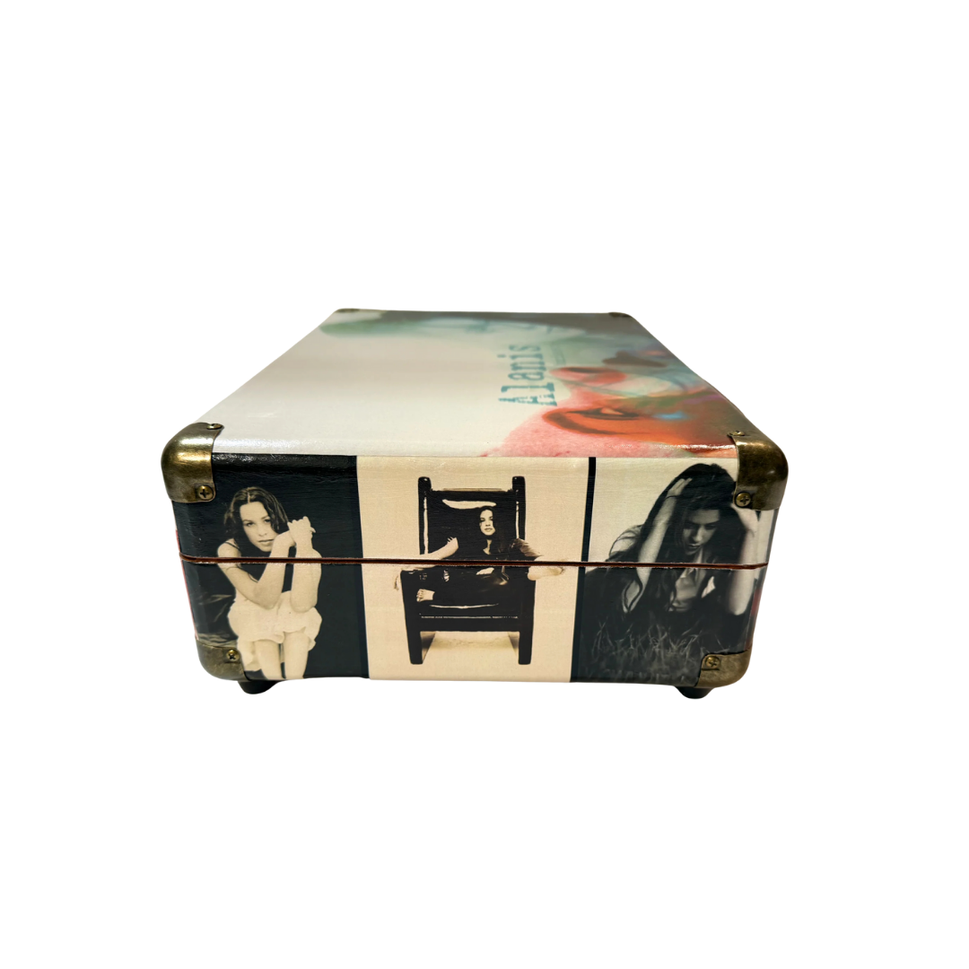 White and black storage box with gold accents, featuring a woman’s portrait design.