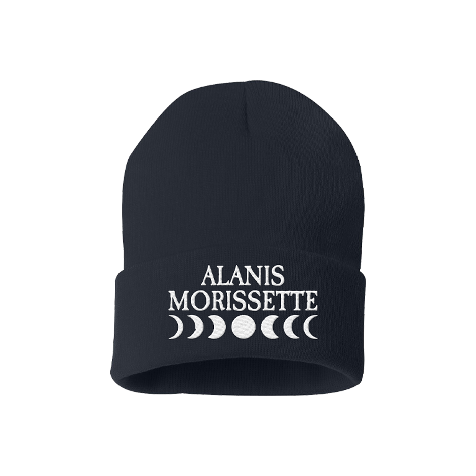 Black knit beanie with ’ALANIS MORISSETTE’ and moon phase symbols embroidered in white.