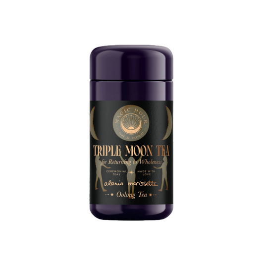 Purple tea tin with a gold and black label.